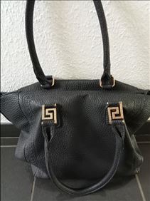 Abbildung: Leder Tasche (L:30, H:30, B:14cm)