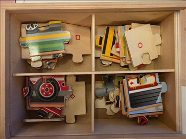 Abbildung: 8 Holz-Puzzles in gutem Zustand