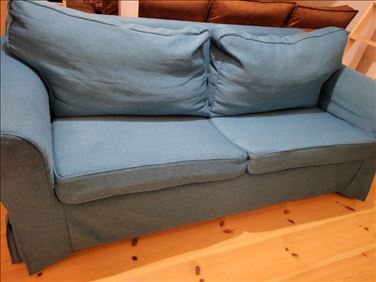 Abbildung: Türkise Couch zu verschenken