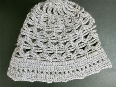 Abbildung: Unbenutzt. Handgestrickte Mütze 