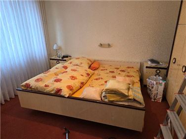 Abbildung: Bett mit 2 x Nachttisch 