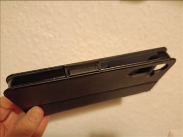 Abbildung: Handyhülle schwarz Leder m. Metallschließe für Samsung