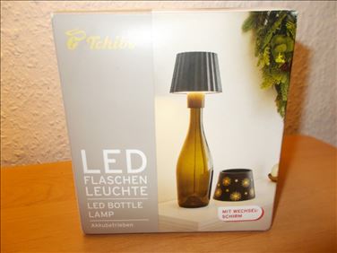 Abbildung: Unbenutzt - LED-Leuchte als Aufsatz auf Wein-/Sektflaschen