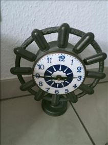 Abbildung: Art-Uhr( D:24cm / H:28cm).Stahl.Voll Funktionsfähig.