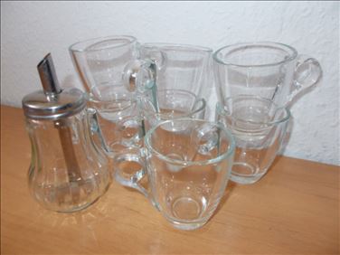 Abbildung: Tausche sieben Espressotassen + Zuckerstreuer ....