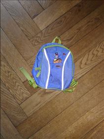 Abbildung: Rucksack, Badetuch, Decke, Stofftiere