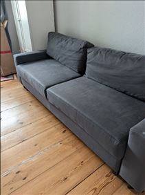 Abbildung: Graue Schlafcouch von Tchibo 