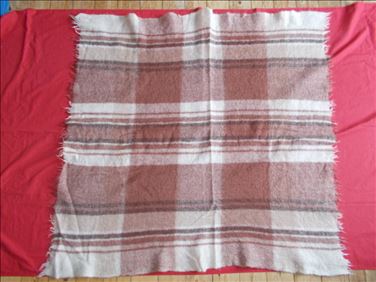 Abbildung: Tausche gewebtes Schurwoll-Plaid 127x127 cm gegen 1x Spüli